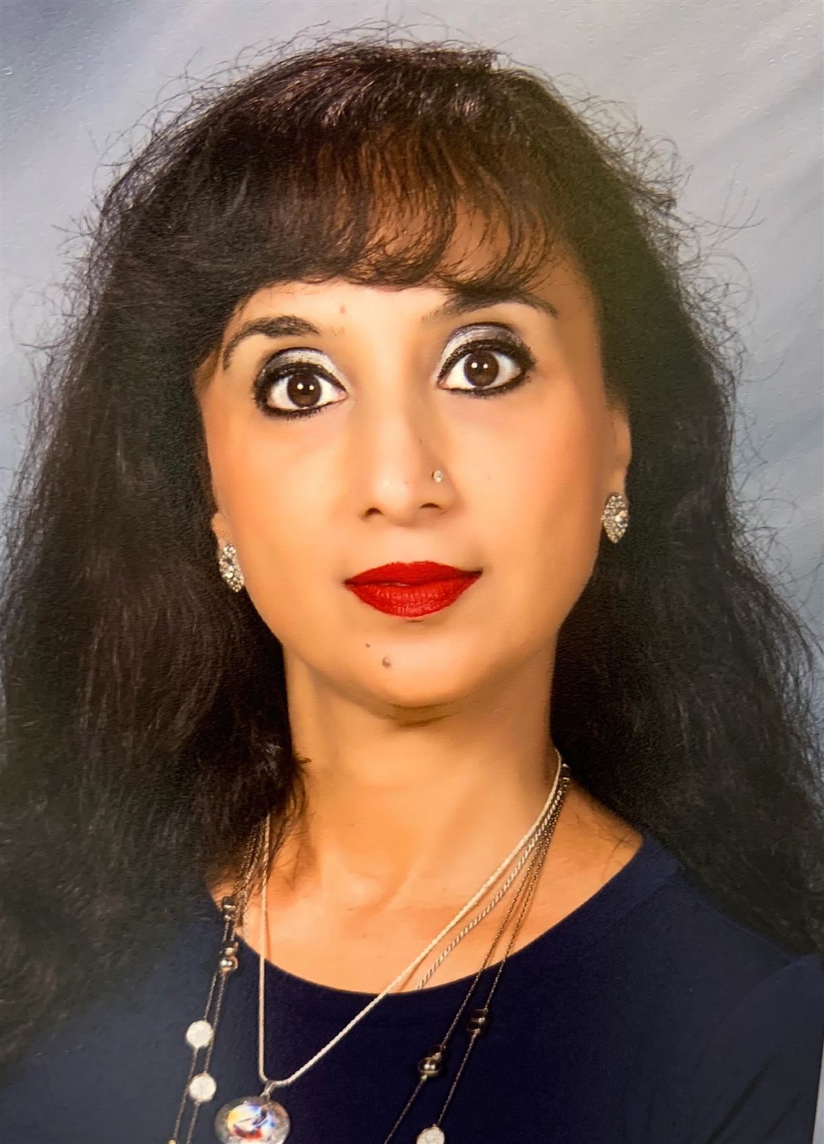 Mrs. Mrinal Joshi Mrs. Mrinal Joshi