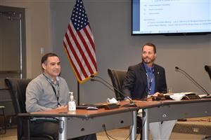 Luis Ferrer and Tim Holtcamp seated 