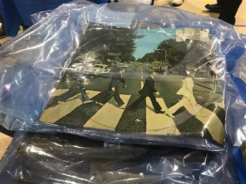 Image of Beatles Abby Road album cover wrapped in plastic 