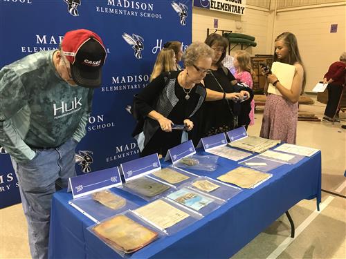 Public viewing documents on table 