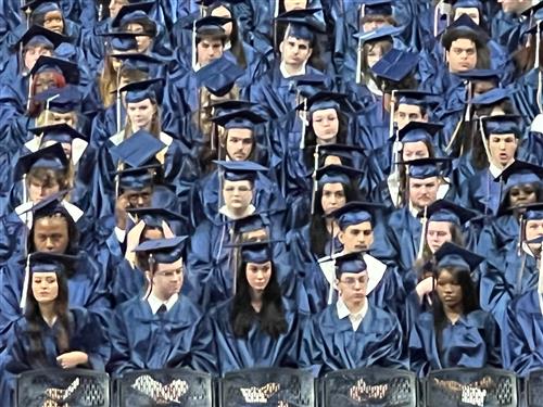 BJ composite of graduates seated 