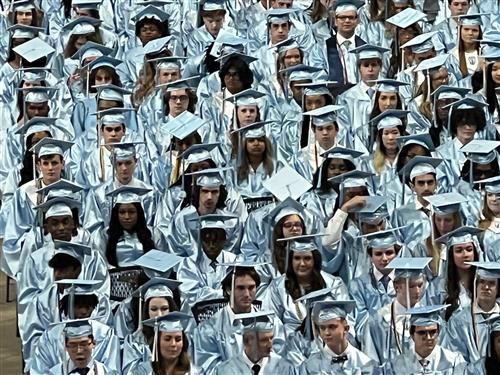 composite telephoto view of jc graduates in seats