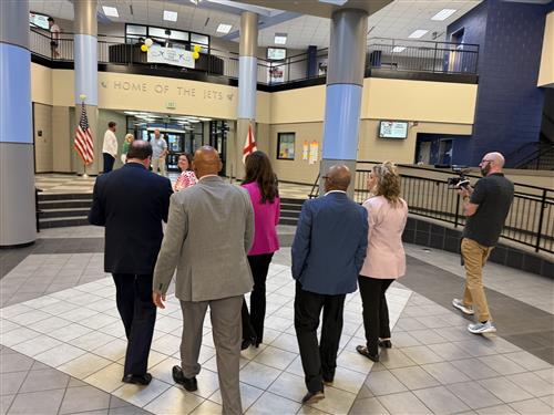 prize patrol walking through school