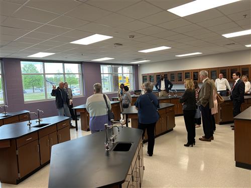 Community leaders touring a lab