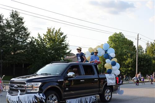 pickup truck with baloons and streamers