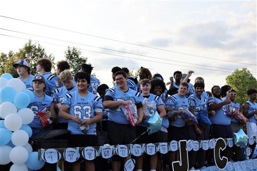 Float with football players on it