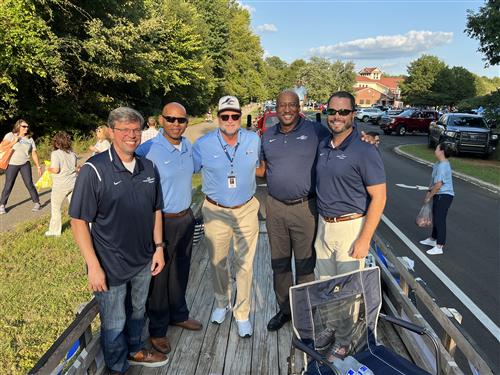 superintendent and assistant superintendent with board members Scott Newberry, Travis CUmmings, Tim Holtcamp