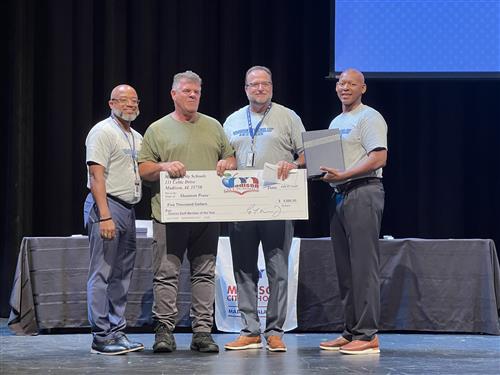 Shannon Pease, shop foreman with Transportation, is District Staff Member of the Year